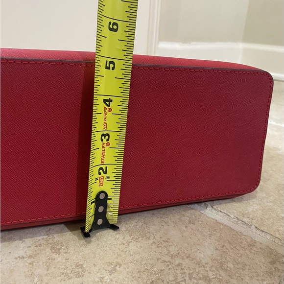 Michael Kors cherry red purse. VGUC, multiple pockets to neatly carry items. - Picture 11 of 13